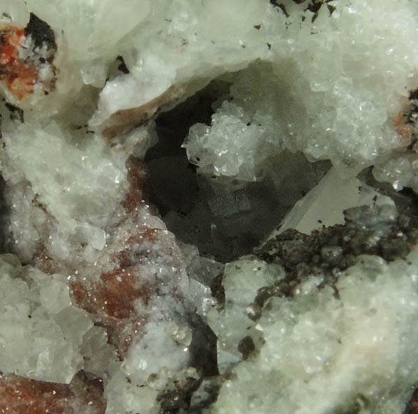 Calcite with Hematite inclusions from Millington Quarry, Bernards Township, Somerset County, New Jersey