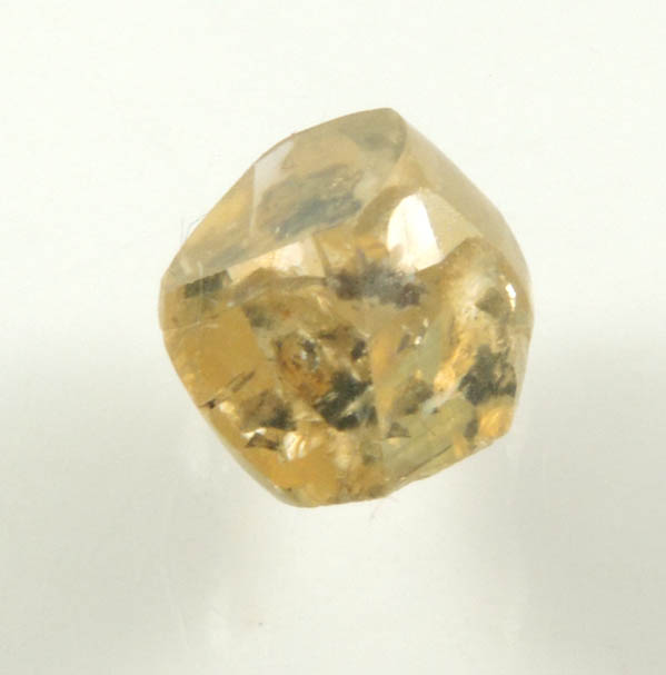 Diamond (1.58 carat brown diamond with dark inclusions) from Oranjemund District, southern coastal Namib Desert, Namibia
