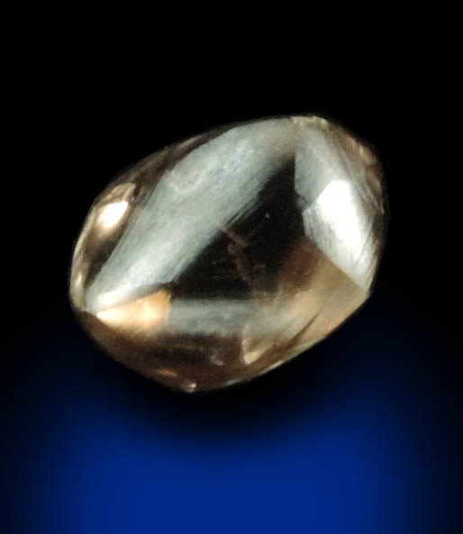 Diamond (0.67 carat brown distorted dodecahedral rough diamond) from Oranjemund District, southern coastal Namib Desert, Namibia