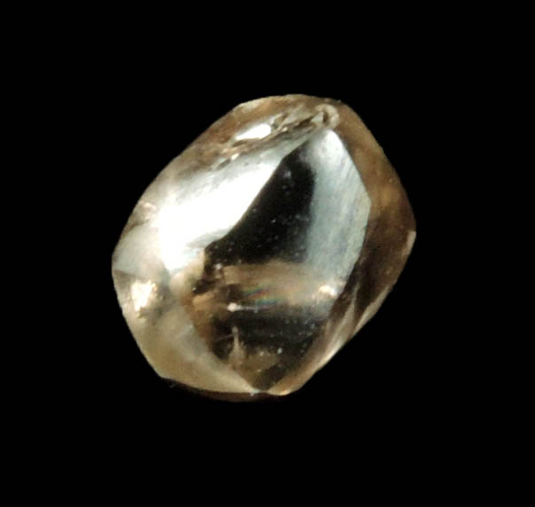 Diamond (0.67 carat brown distorted dodecahedral rough diamond) from Oranjemund District, southern coastal Namib Desert, Namibia