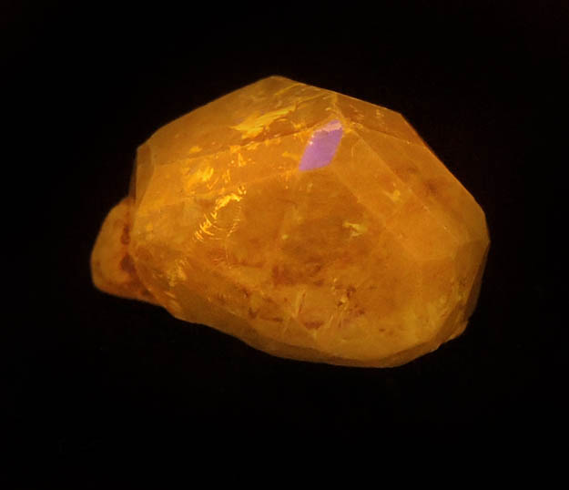 Photo below under shortwave ultraviolet illumination of Grossular var. Tsavorite Garnet from Merelani Hills, near Arusha, Tanzania Grossular var. Tsavorite Garnet from Merelani Hills, near Arusha, Tanzania