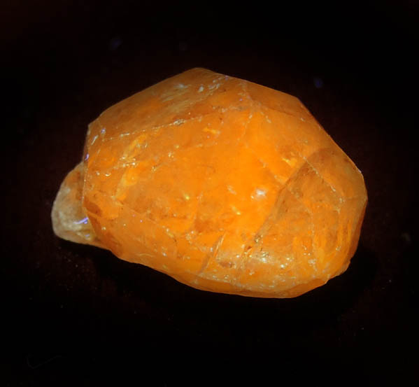 Photo below under longwave ultraviolet illumination of Grossular var. Tsavorite Garnet from Merelani Hills, near Arusha, Tanzania Grossular var. Tsavorite Garnet from Merelani Hills, near Arusha, Tanzania