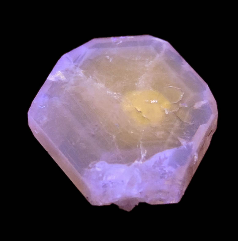 Photo below under shortwave ultraviolet illumination of Fluorapatite from Conselheiro Pena District, Minas Gerais, Brazil Fluorapatite from Conselheiro Pena District, Minas Gerais, Brazil