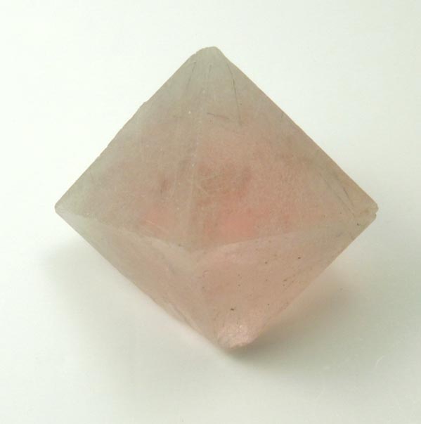 Fluorite (pink) with fibrous inclusions of actinolite-hedenbergite from Huanggang Mine, Kèshíkèténg Qí, Chifeng, China