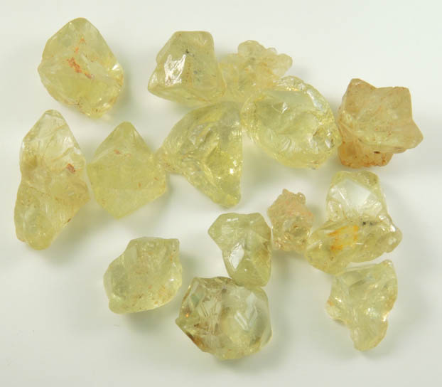 Chrysoberyl (14 gem-grade twinned crystals) from Pancas, Esprito Santo, Brazil