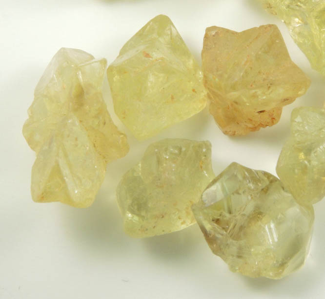 Chrysoberyl (14 gem-grade twinned crystals) from Pancas, Esprito Santo, Brazil