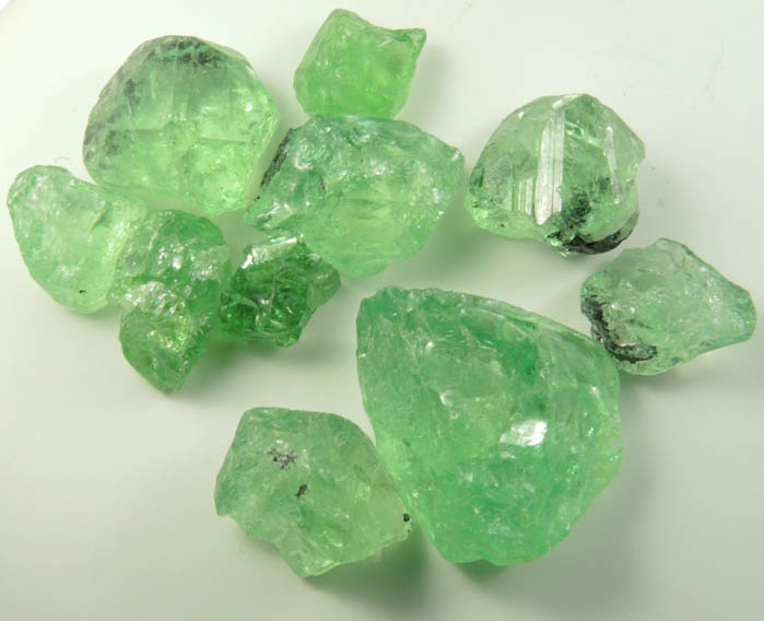 Grossular var. Tsavorite Garnet (cutting rough) from Merelani Hills, near Arusha, Tanzania