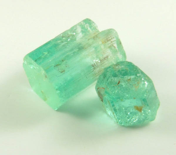 Beryl var. Emerald (two partial crystals) from Vasquez-Yacopi Mining District, Boyac Department, Colombia