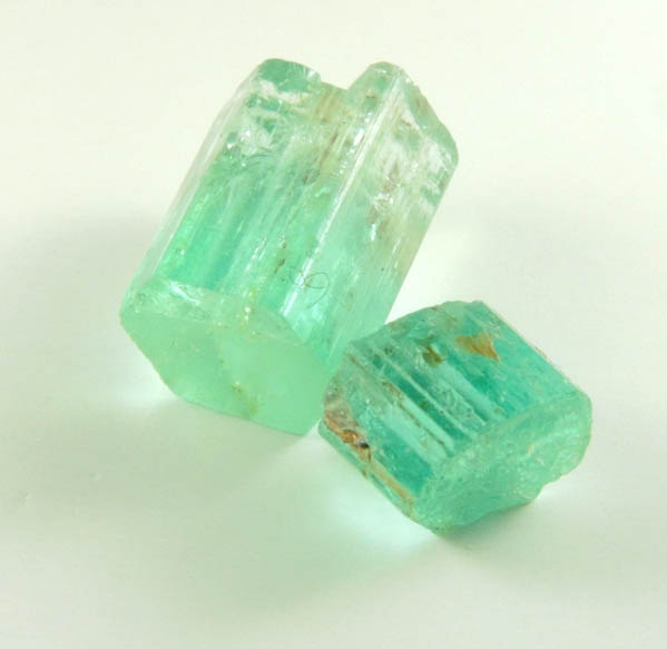 Beryl var. Emerald (two partial crystals) from Vasquez-Yacopi Mining District, Boyac Department, Colombia