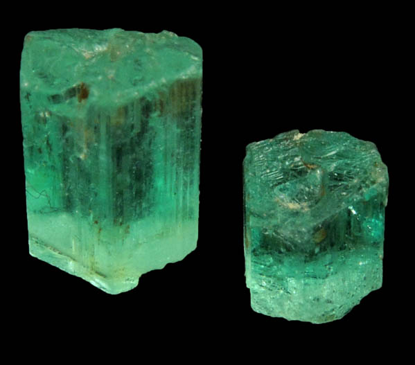 Beryl var. Emerald (two partial crystals) from Vasquez-Yacopi Mining District, Boyac Department, Colombia