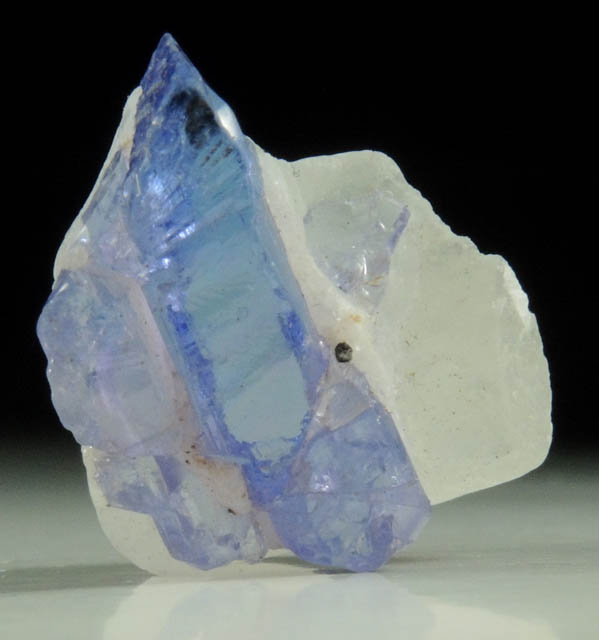 Tanzanite Crystal (blue gem variety of the mineral Zoisite) in Calcite from Merelani Hills, western slope of Lelatama Mountains, Arusha Region, Tanzania (Type Locality for Tanzanite)