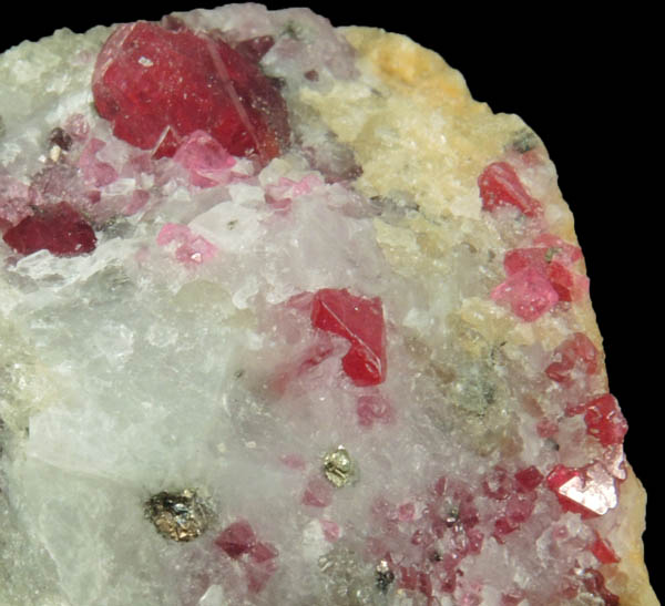 Spinel, Zircon, Pyrite in marble from Mogok District, 115 km NNE of Mandalay, border region between Sagaing and Mandalay Divisions, Myanmar