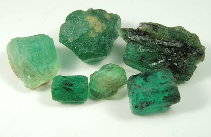 Beryl var. Emerald (six gem rough) from Vasquez-Yacopi Mining District, Boyac Department, Colombia