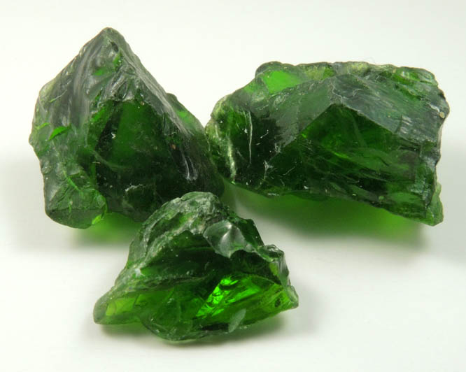 Diopside var. Chrome Diopside (gem rough) from Inagli, Siberia, Russia