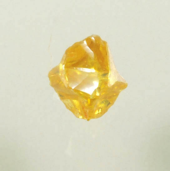 Diamond (0.14 carat fancy-yellow cubic cavernous rough diamond) from Mbuji-Mayi, 300 km east of Tshikapa, Democratic Republic of the Congo