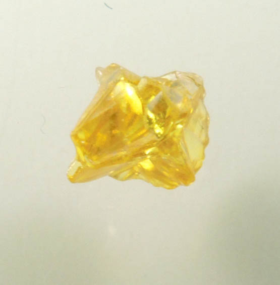 Diamond (0.28 carat fancy-yellow cubic cavernous rough diamond) from Mbuji-Mayi, 300 km east of Tshikapa, Democratic Republic of the Congo