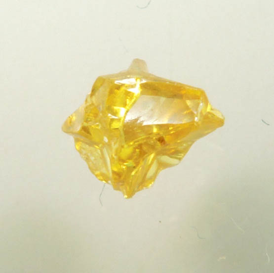 Diamond (0.28 carat fancy-yellow cubic cavernous rough diamond) from Mbuji-Mayi, 300 km east of Tshikapa, Democratic Republic of the Congo