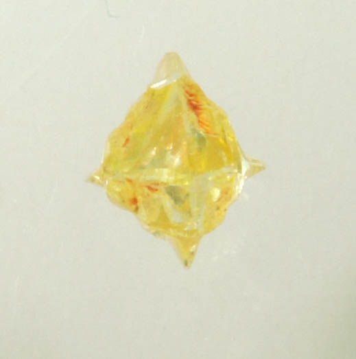 Diamond (0.12 carat fancy-yellow cubic cavernous rough diamond) from Mbuji-Mayi, 300 km east of Tshikapa, Democratic Republic of the Congo