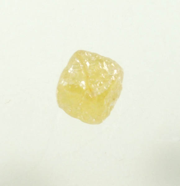 Diamond (0.13 carat fancy-yellow cubic rough diamond) from Mbuji-Mayi, 300 km east of Tshikapa, Democratic Republic of the Congo