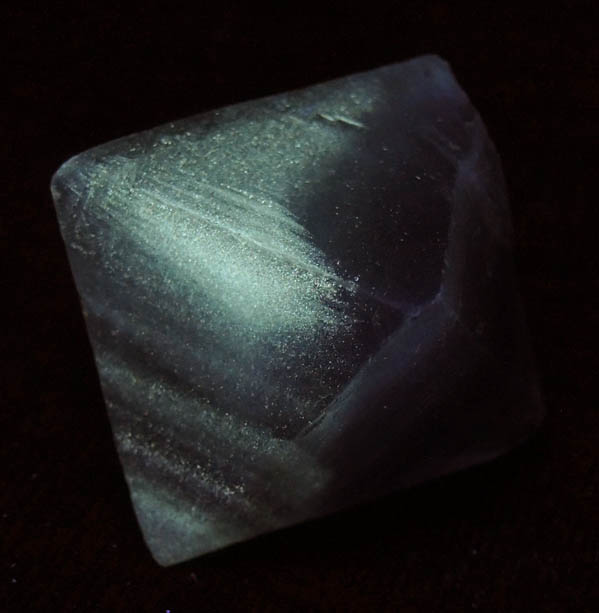 Fluorite with hydrocarbon inclusions (cleavage) from Cave-in-Rock District, Hardin County, Illinois