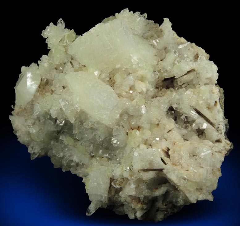 Heulandite, Prehnite Calcite on Quartz with pseudomorphic molds after Anhydrite from Upper New Street Quarry, Paterson, Passaic County, New Jersey