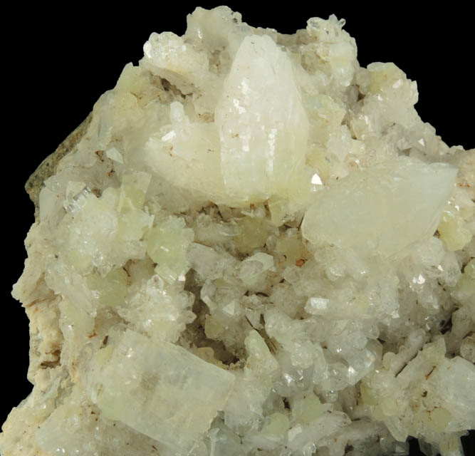 Heulandite, Prehnite Calcite on Quartz with pseudomorphic molds after Anhydrite from Upper New Street Quarry, Paterson, Passaic County, New Jersey
