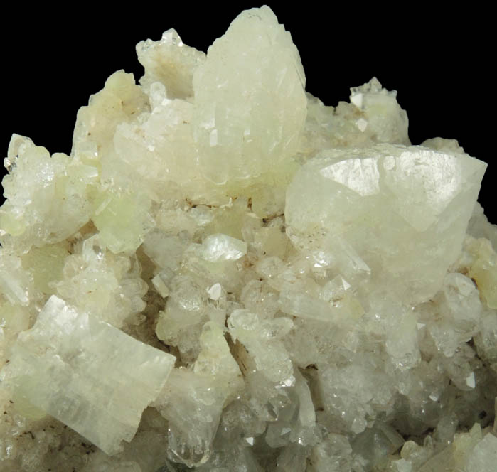 Heulandite, Prehnite Calcite on Quartz with pseudomorphic molds after Anhydrite from Upper New Street Quarry, Paterson, Passaic County, New Jersey