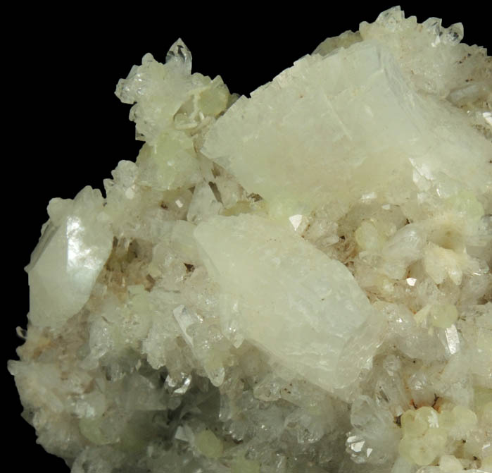 Heulandite, Prehnite Calcite on Quartz with pseudomorphic molds after Anhydrite from Upper New Street Quarry, Paterson, Passaic County, New Jersey