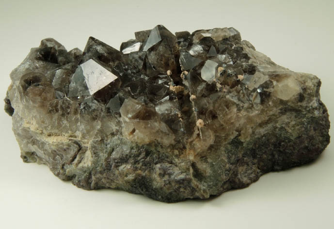 Quartz var. Smoky Quartz with Calcite and pseudomorphic mold after Anhydrite from Upper New Street Quarry, Paterson, Passaic County, New Jersey