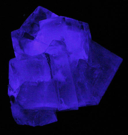 Photo below under longwave ultraviolet illumination of Fluorite (color-zoned interpenetrant-twinned crystals) from Weardale, County Durham, England Fluorite (color-zoned interpenetrant-twinned crystals) from Weardale, County Durham, England