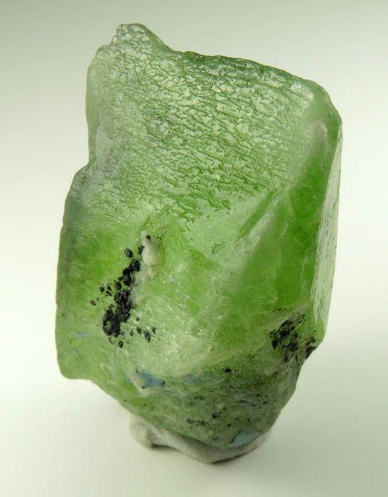 Peridot crystal (gem variety of Forsterite) with Ludwigite inclusions from Suppat, Naran-Kagan Valley, Kohistan District, Khyber Pakhtunkhwa (North-West Frontier Province), Pakistan