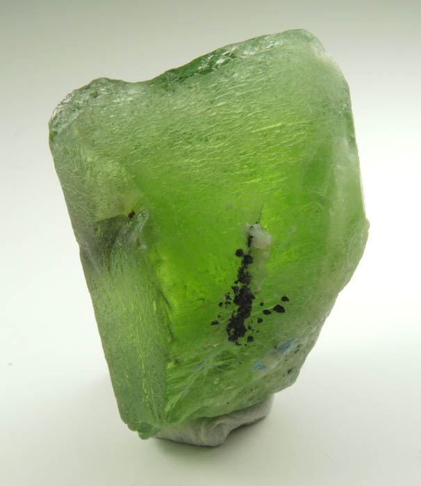 Peridot crystal (gem variety of Forsterite) with Ludwigite inclusions from Suppat, Naran-Kagan Valley, Kohistan District, Khyber Pakhtunkhwa (North-West Frontier Province), Pakistan