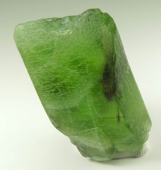 Peridot crystal (gem variety of Forsterite) with Ludwigite inclusions from Suppat, Naran-Kagan Valley, Kohistan District, Khyber Pakhtunkhwa (North-West Frontier Province), Pakistan