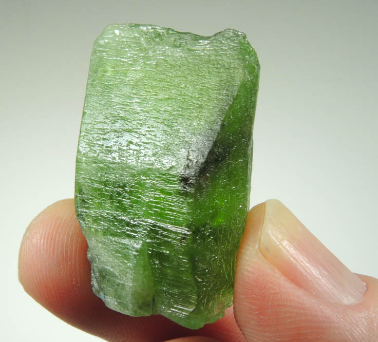 Peridot crystal (gem variety of Forsterite) with Ludwigite inclusions from Suppat, Naran-Kagan Valley, Kohistan District, Khyber Pakhtunkhwa (North-West Frontier Province), Pakistan