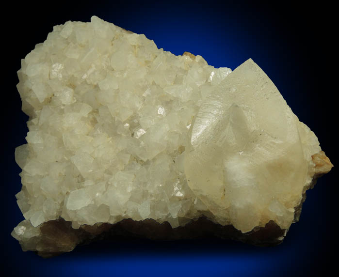 Calcite (twinned crystals) over Stilbite from Moore's Station Quarry, 44 km northeast of Philadelphia, Mercer County, New Jersey