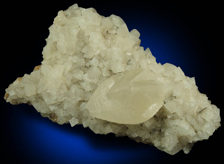 Calcite (twinned crystals) over Stilbite from Moore's Station Quarry, 44 km northeast of Philadelphia, Mercer County, New Jersey