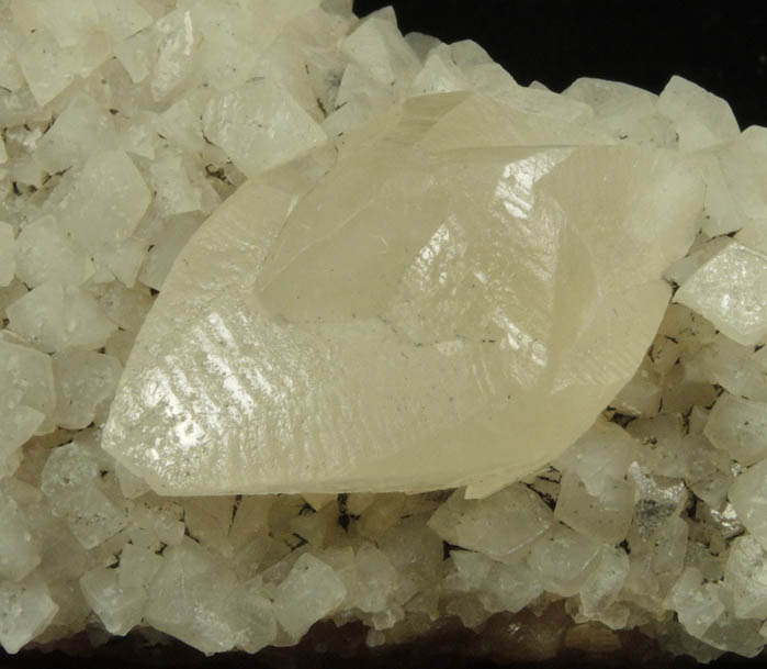 Calcite (twinned crystals) over Stilbite from Moore's Station Quarry, 44 km northeast of Philadelphia, Mercer County, New Jersey