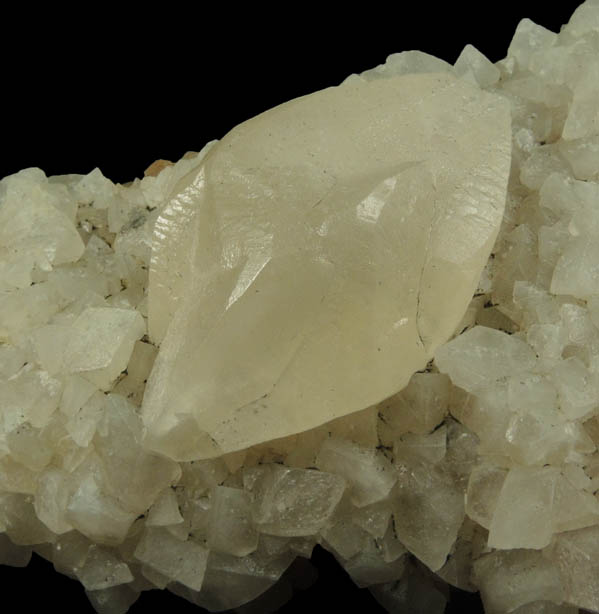 Calcite (twinned crystals) over Stilbite from Moore's Station Quarry, 44 km northeast of Philadelphia, Mercer County, New Jersey