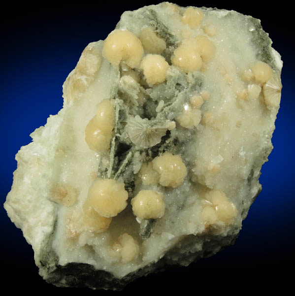 Stilbite and Calcite with pseudomorphic molds after Anhydrite from Millington Quarry, Bernards Township, Somerset County, New Jersey