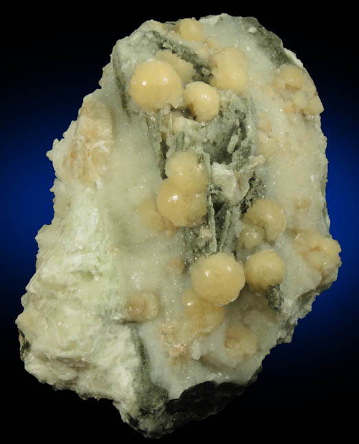Stilbite and Calcite with pseudomorphic molds after Anhydrite from Millington Quarry, Bernards Township, Somerset County, New Jersey