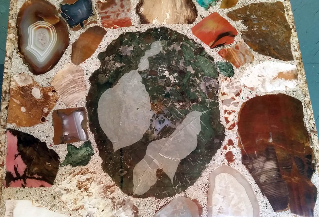 Quartz var. Agate and Petrified Wood (set in polyester resin coffee table) from Washington and Oregon