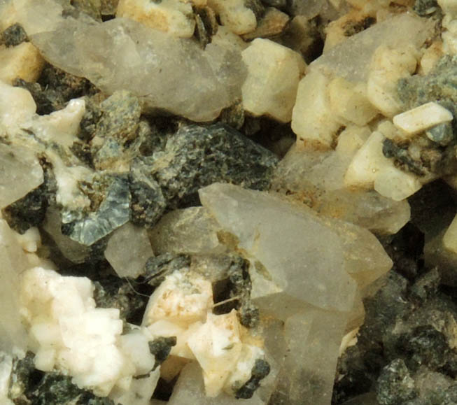 Quartz and Microcline with unknown from Elephant Mountain pegmatite prospect, 14km ENE of Greenville, Piscataquis County, Maine