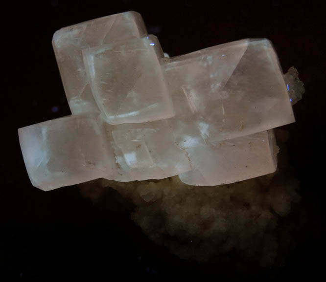 Photo below under longwave ultraviolet illumination of Calcite with Pyrrhotite from Dalnegorsk, Primorskiy Kray, Russia Calcite with Pyrrhotite from Dalnegorsk, Primorskiy Kray, Russia