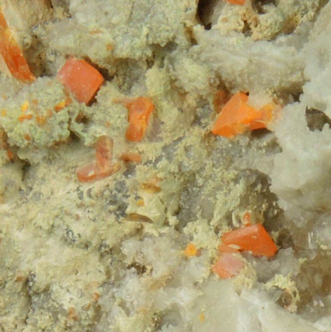 Wulfenite on Quartz from Manhan Lead Mines, Loudville District, 3 km northwest of Easthampton, Hampshire County, Massachusetts