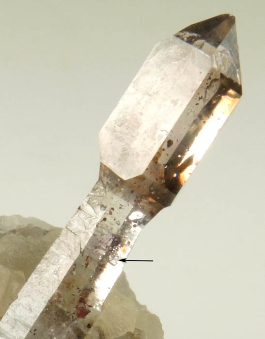 Quartz (Scepter Formation) with Hematite inclusions and bubble in fluid-filled cavity (Enhydro) from Goboboseb Mountains, 43 km west of Brandberg Mountain, Erongo region, Namibia