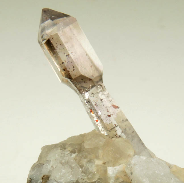 Quartz (Scepter Formation) with Hematite inclusions and bubble in fluid-filled cavity (Enhydro) from Goboboseb Mountains, 43 km west of Brandberg Mountain, Erongo region, Namibia