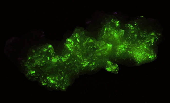 Photo below under shortwave ultraviolet illumination of Prehnite with Quartz from Krimmler Achental, Hohe Tauern, Salzburg, Austria Prehnite with Quartz from Krimmler Achental, Hohe Tauern, Salzburg, Austria