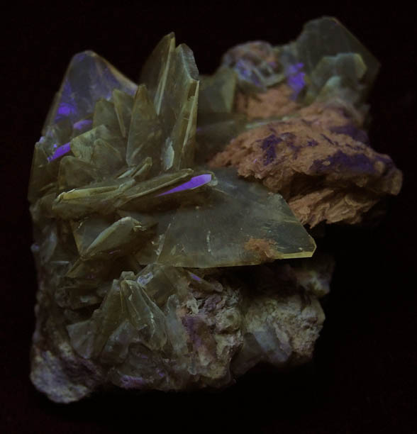 Photo below under shortwave ultraviolet illumination of Colemanite from Kramer Deposit, Boron, Kern County, California Colemanite from Kramer Deposit, Boron, Kern County, California