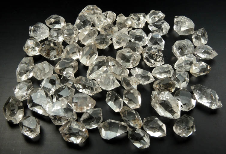 Quartz var. Herkimer Diamonds (collection of 64 crystals, 9-15 mm) from Hickory Hill Diamond Diggings, Fonda, Montgomery County, New York