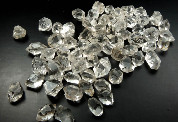 Quartz var. Herkimer Diamonds (collection of 64 crystals, 9-15 mm) from Hickory Hill Diamond Diggings, Fonda, Montgomery County, New York